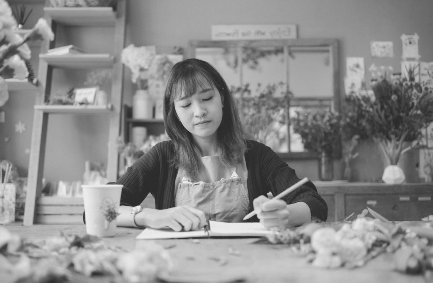 Professional floristry workspace showcasing collaborative learning environment