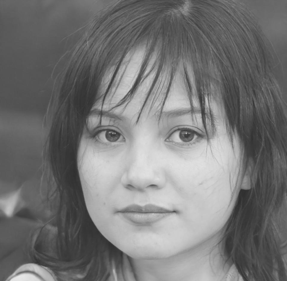 Portrait of Nergiz smiling warmly